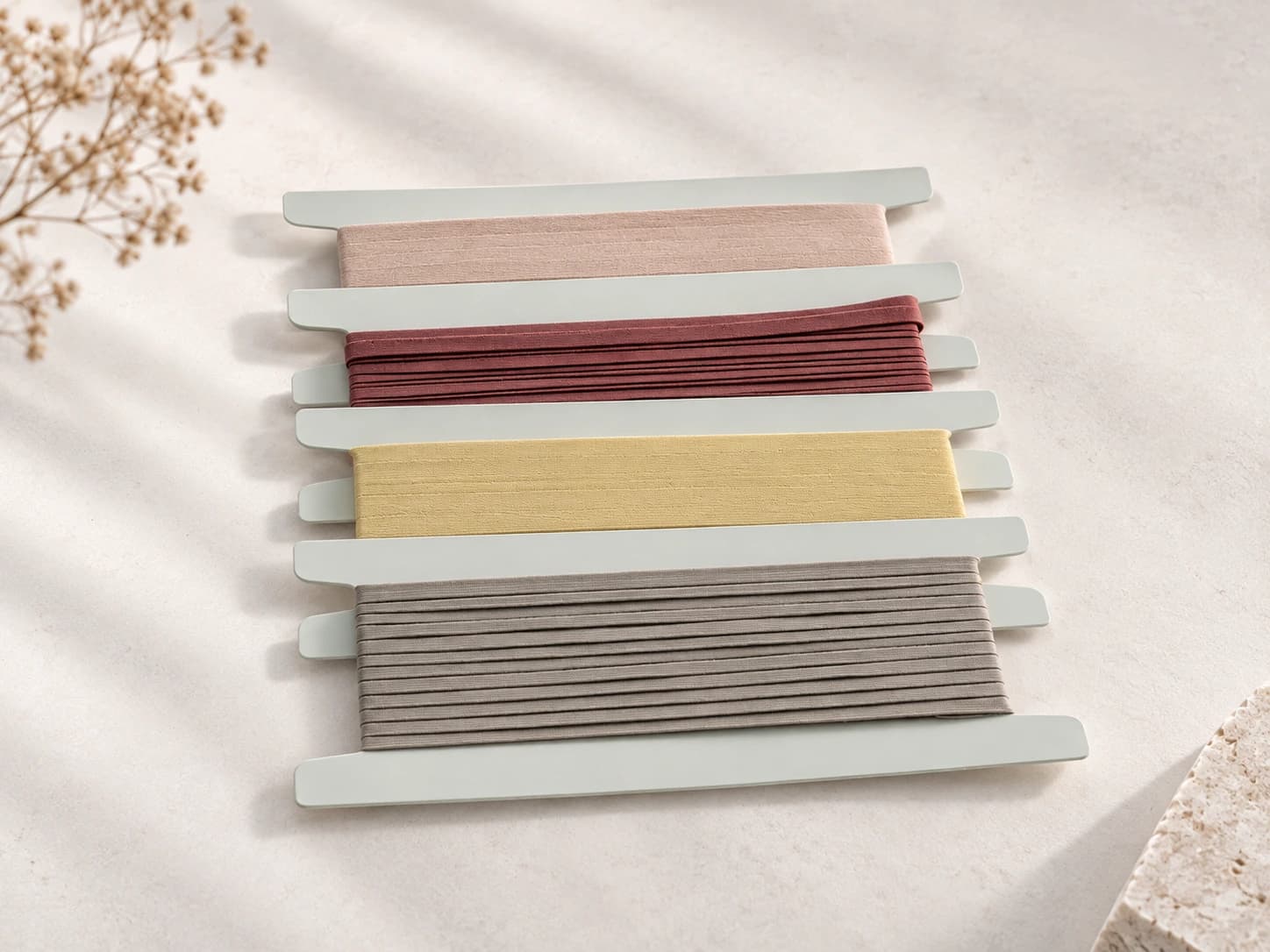 Brand visual of minimal textile sample strips